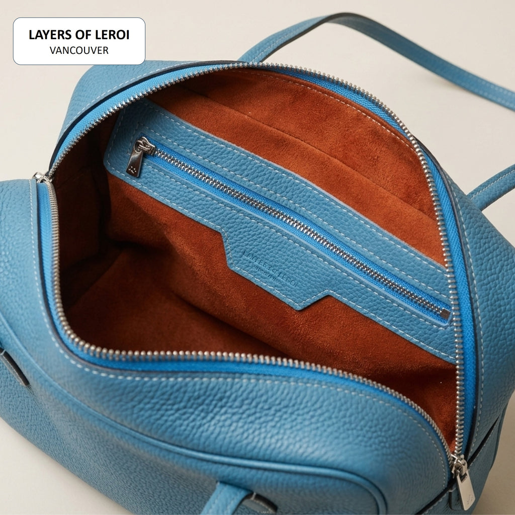 Open Keywest Bag 25 showing its zippered and open interior pockets