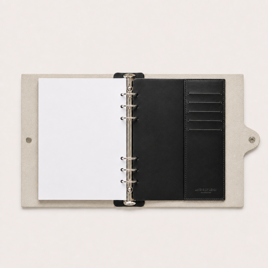 Black detachable leather card pocket installed in a Layers of LeRoi six-ring journal cover