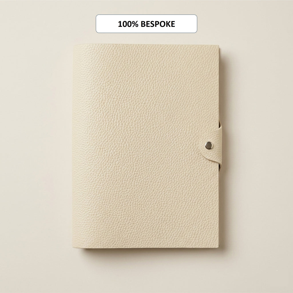 Custom-made Egg Shell German Togo leather A5 six-ring journal cover with PRYM snap closure
