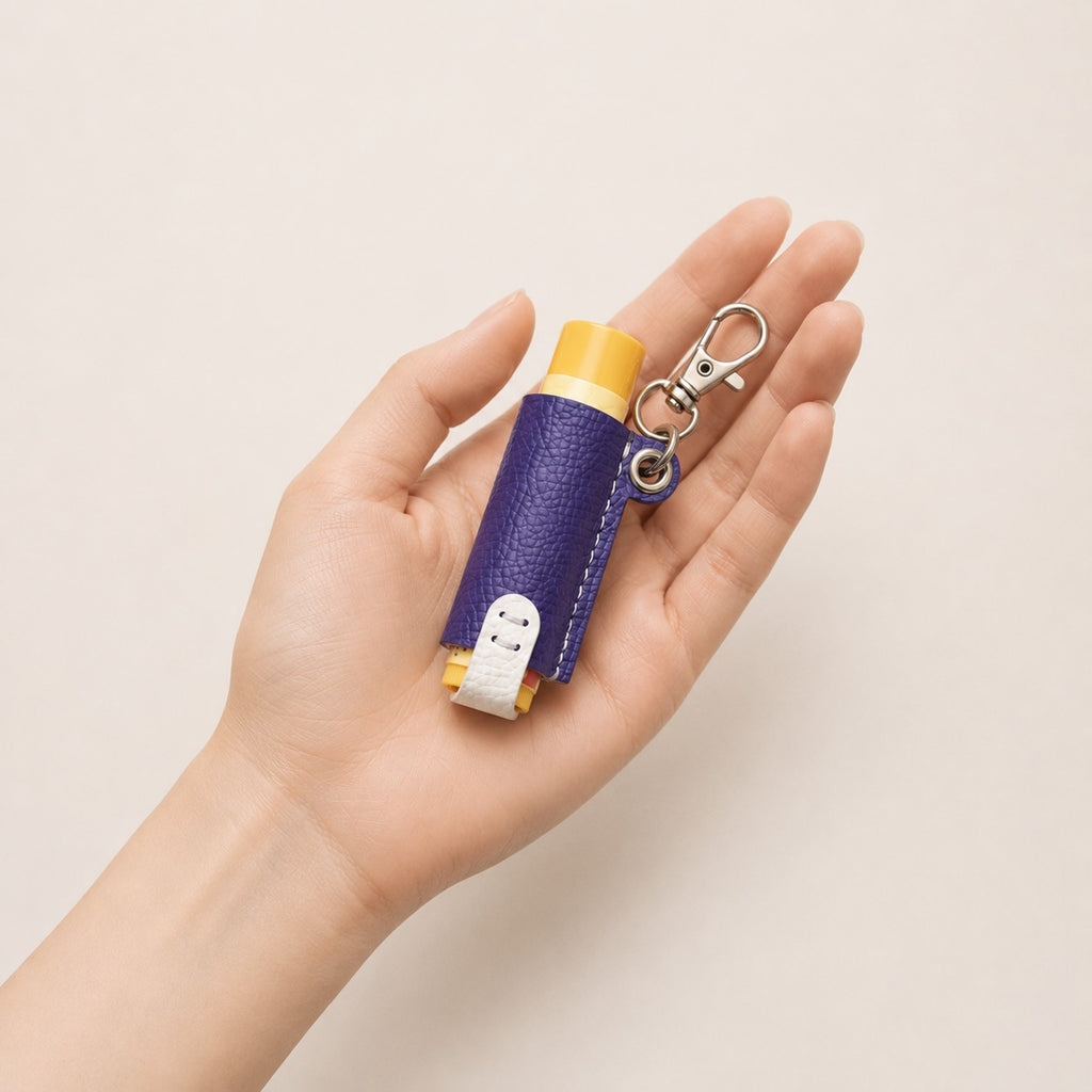 Compact Lip Balm Holder shown in one hand for scale