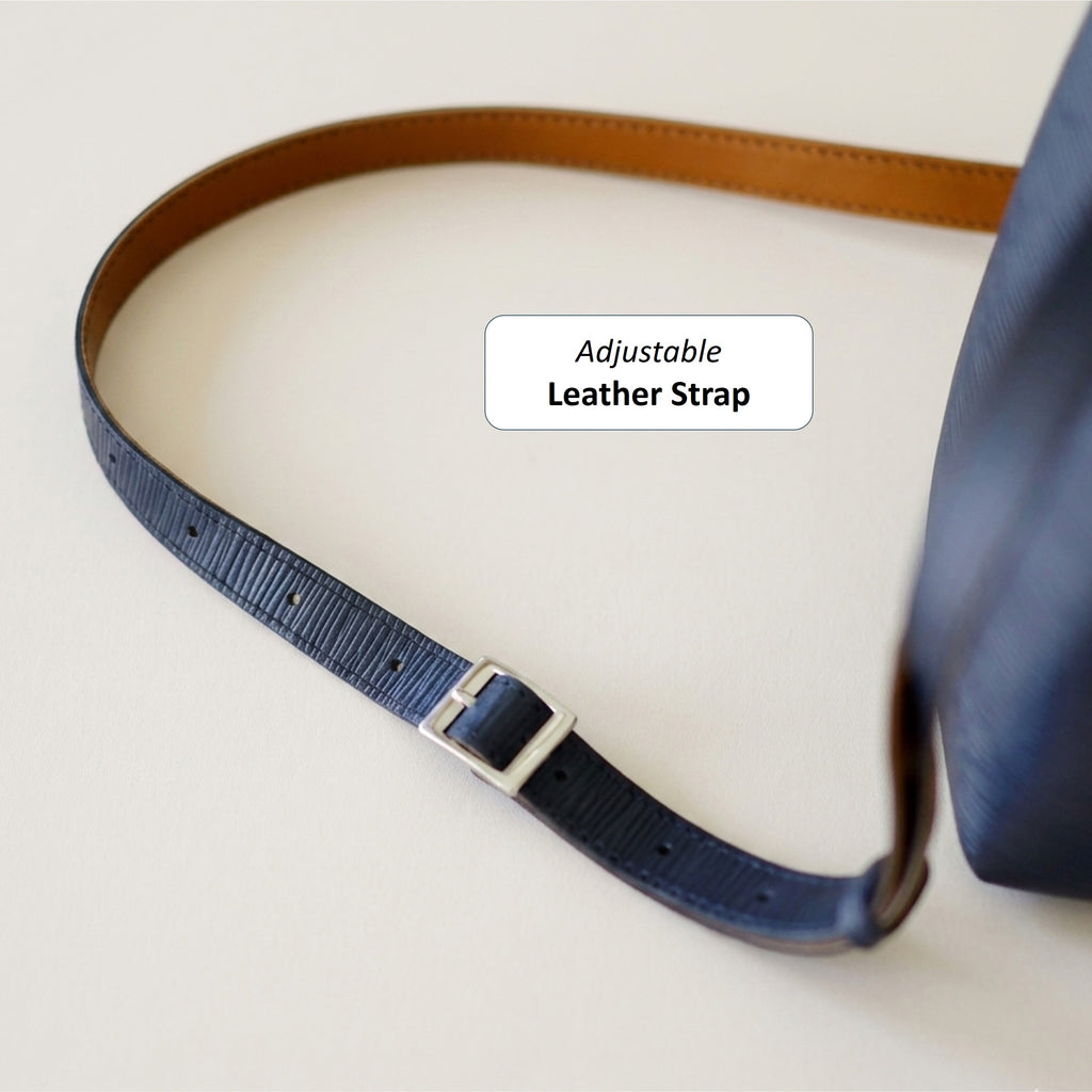 Close-up of the adjustable full leather strap for the Dorothy Mini Bag