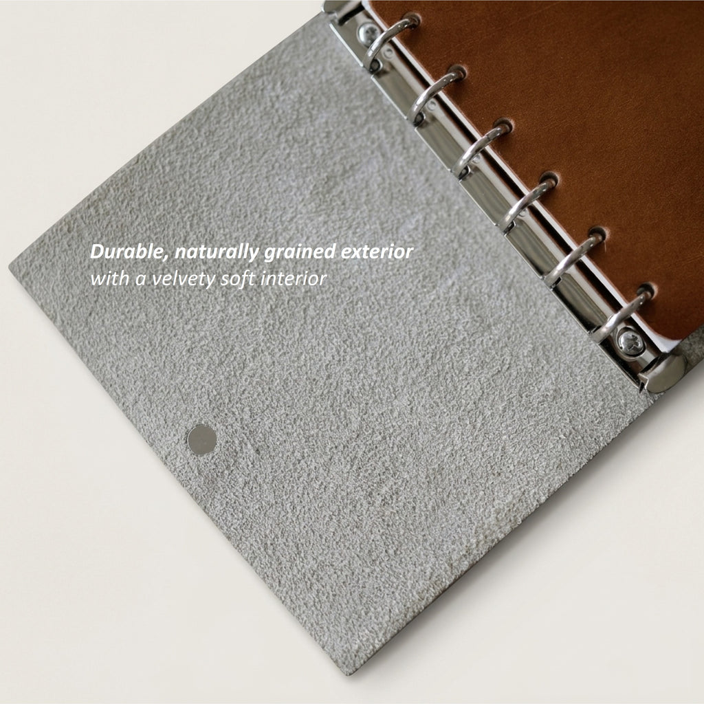 A7 six-ring journal cover with a durable German Togo leather exterior and soft suede interior surface
