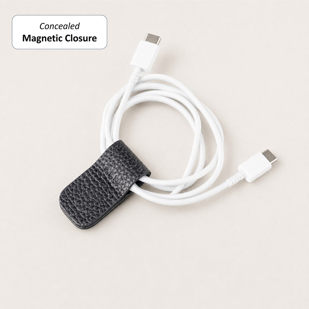 Optional initial engraving on a Dark Navy German Togo leather Cord Wrap.