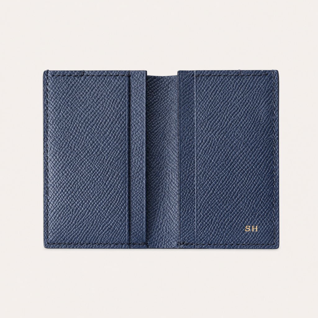 Open navy Tyrian Minimal Wallet showing its card slots and lined interior