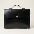 Clean front view of The Origin Bridle leather briefcase