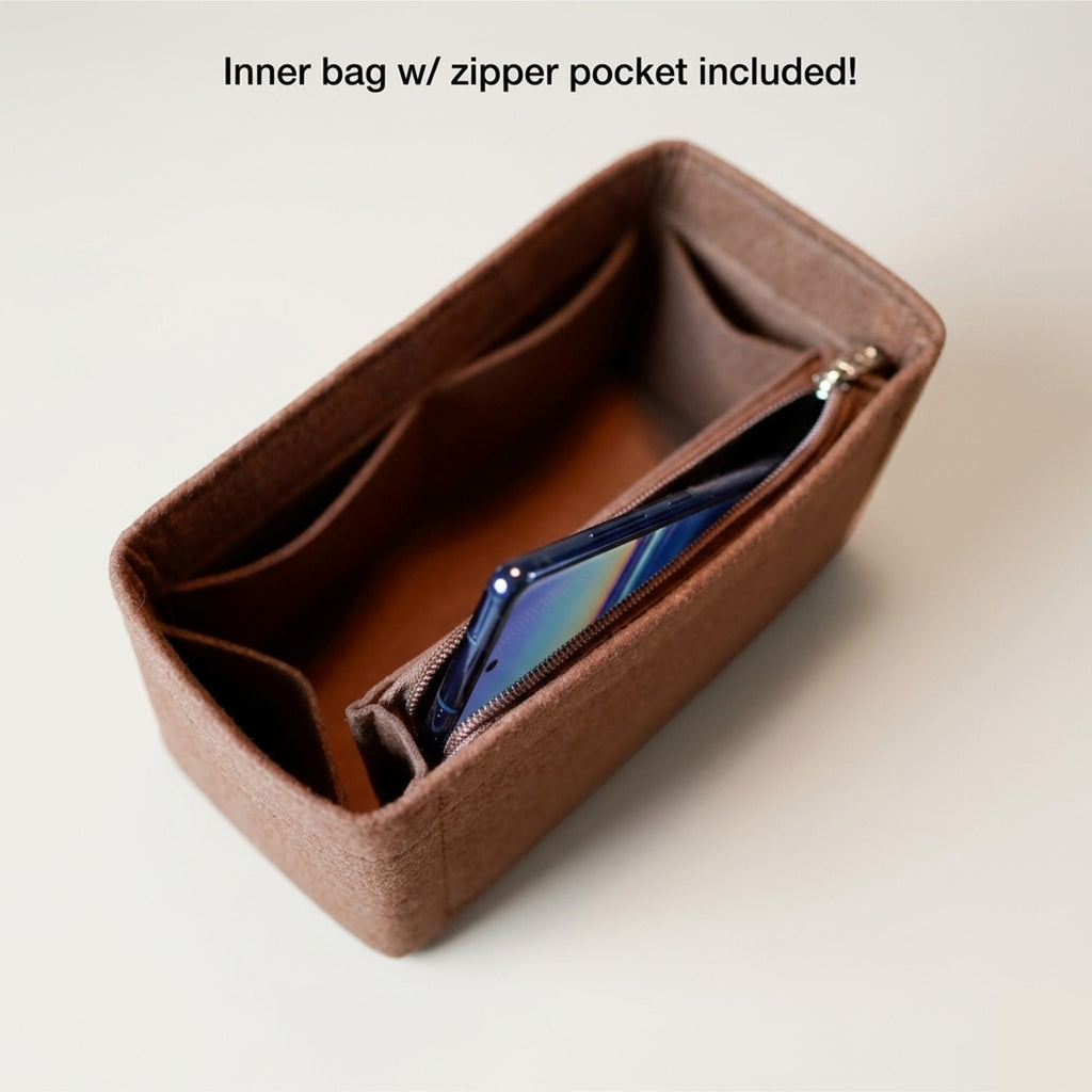 Removable zippered inner pouch included with the Dorothy Bag