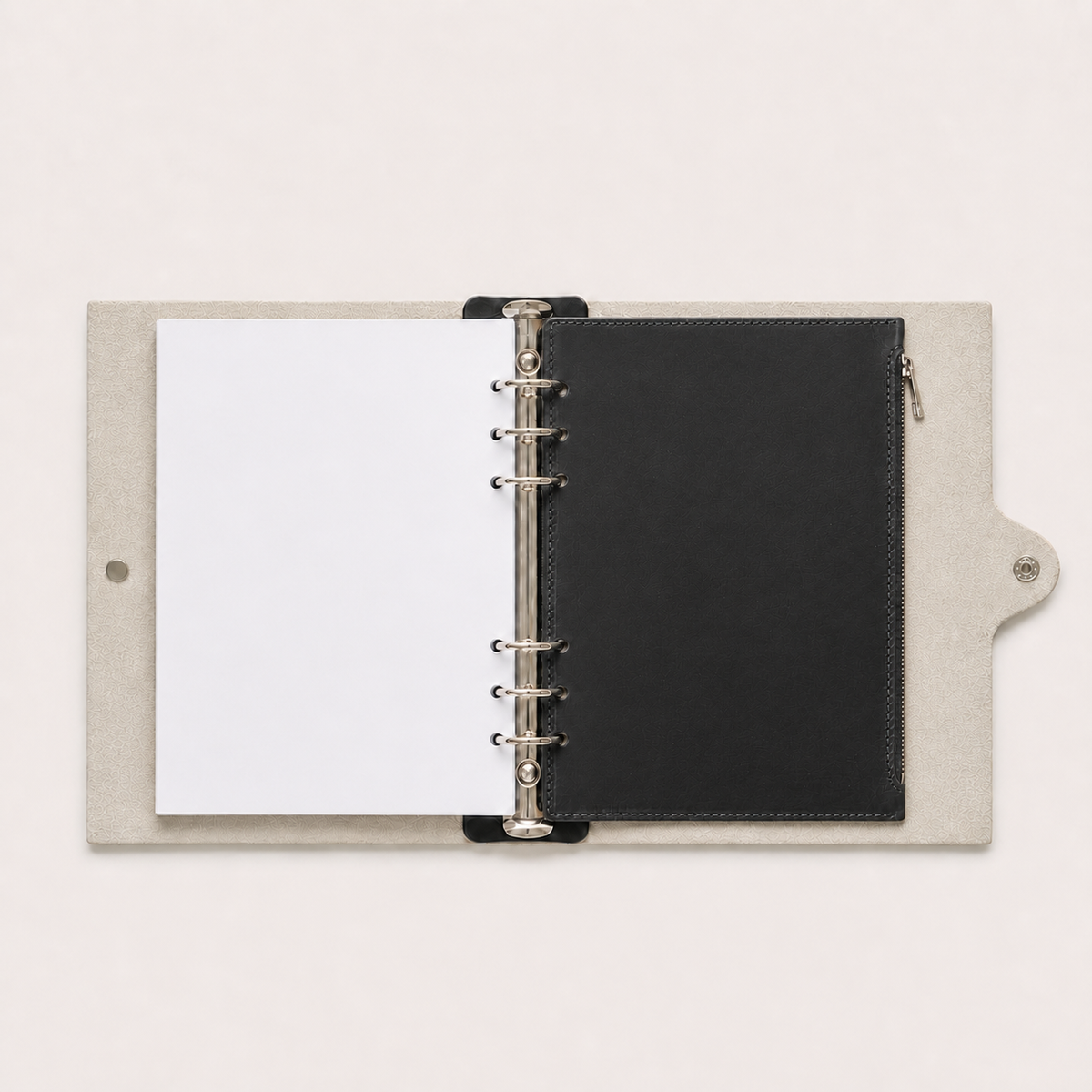 Black detachable leather zip pocket installed inside a Layers of LeRoi six-ring journal cover